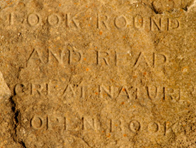 Engraved rock at Tilly Whim. Photo: Simon Kidner