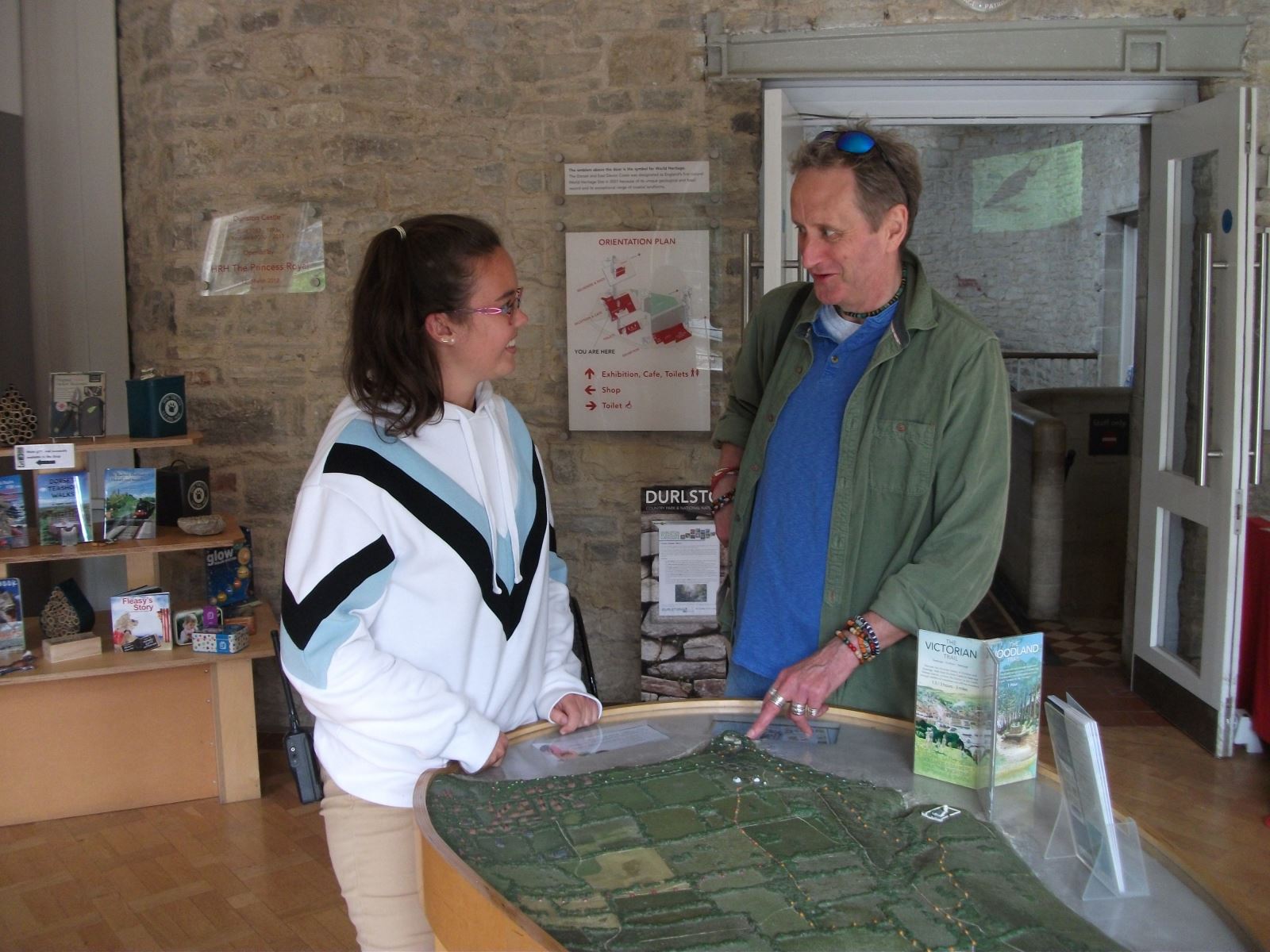 Volunteer talking to visitor in the Castle