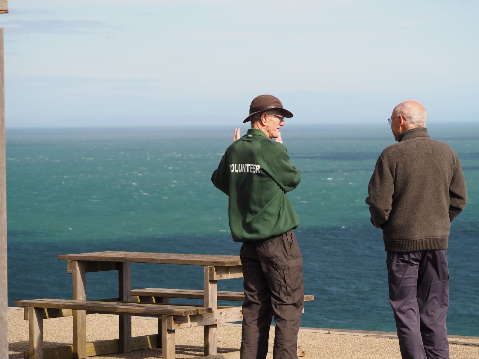 Volunteer talking to visitor in the Castle